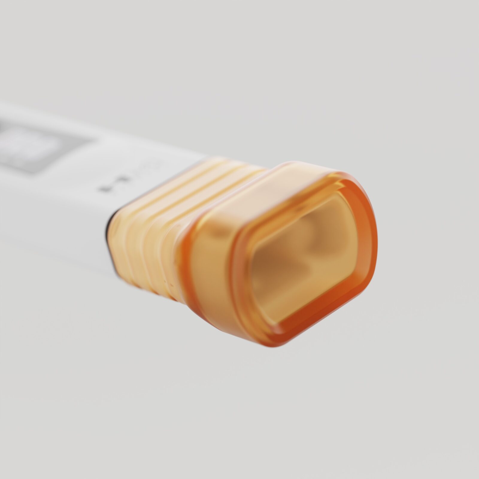Shallow-depth-of-field view of the PH-80 amber sensor-cap rim with the white meter body receding into blur.
